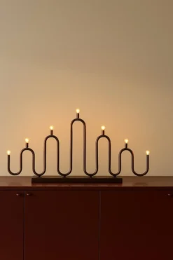 Noel 7 -adventtikynttelikkö, Pronssi